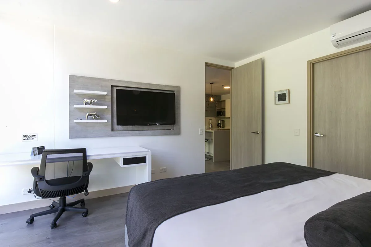 Bedroom with work desk in a Classic apartment at Soul Lifestyle Apartments