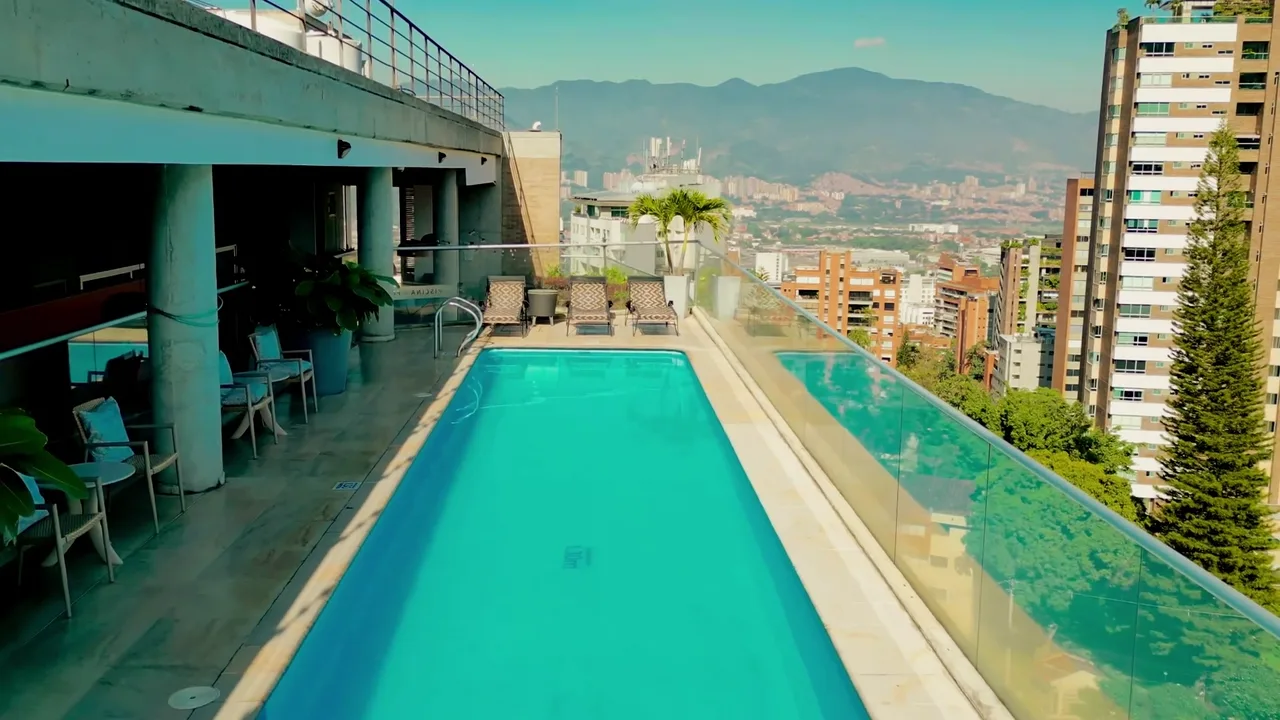 Rooftop pool at Soul Lifestyle Apartments overlooking El Poblado and the Medellín valley