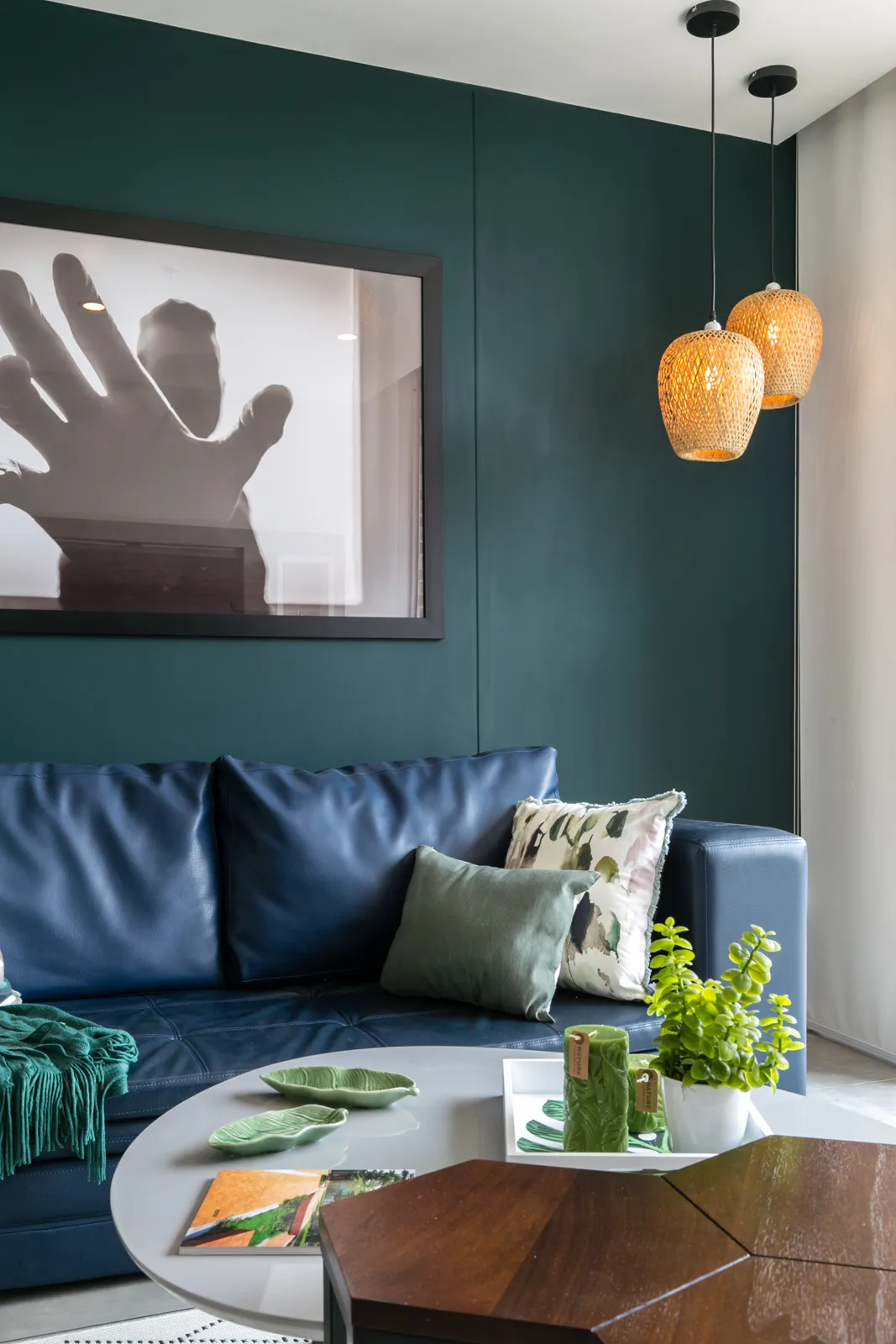 Living room detail with sofa and wall art in the apartment for sale at Soul Lifestyle
