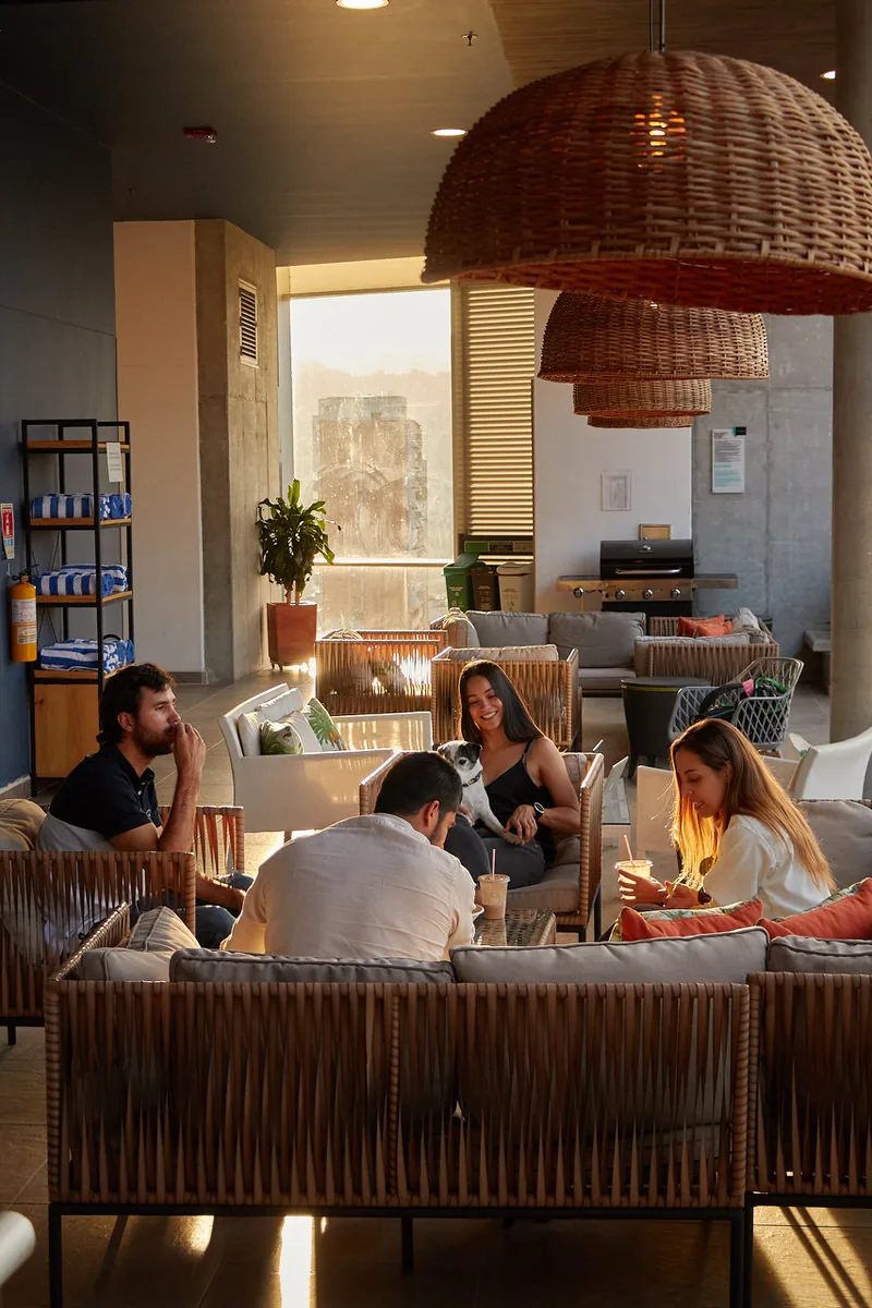 Guests socializing in the lounge at Soul Lifestyle Apartments, El Poblado