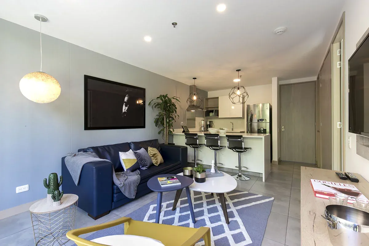 Living room of a furnished one-bedroom apartment at Soul Lifestyle Apartments, Medellín
