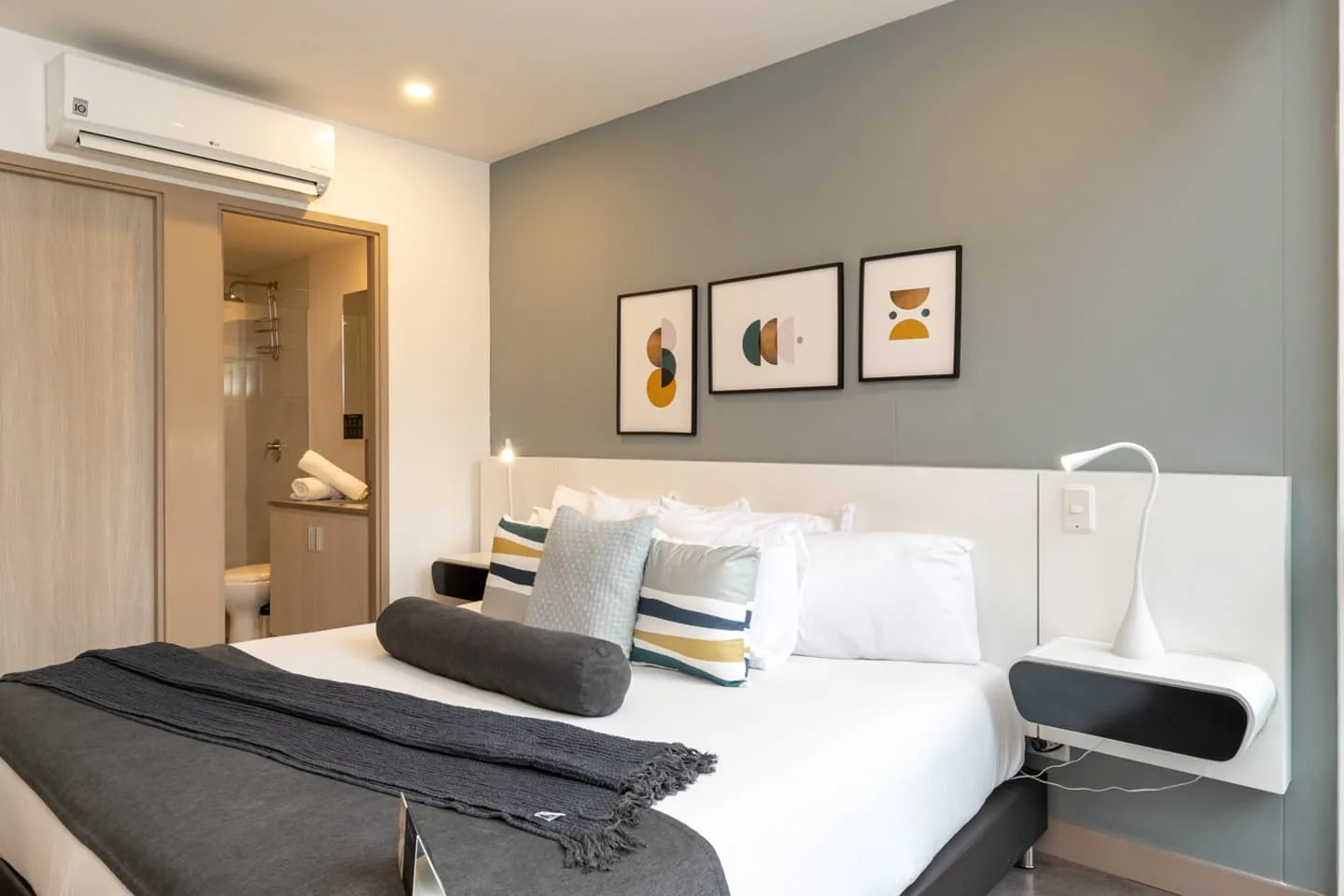 Bedroom with wall art in the condo-hotel apartment for sale at Soul Lifestyle